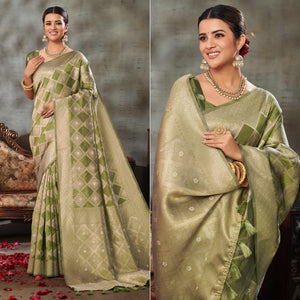green-woven-organza-saree-with-tassels