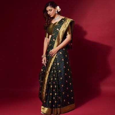 green-woven-organza-saree-with-tassels-143542