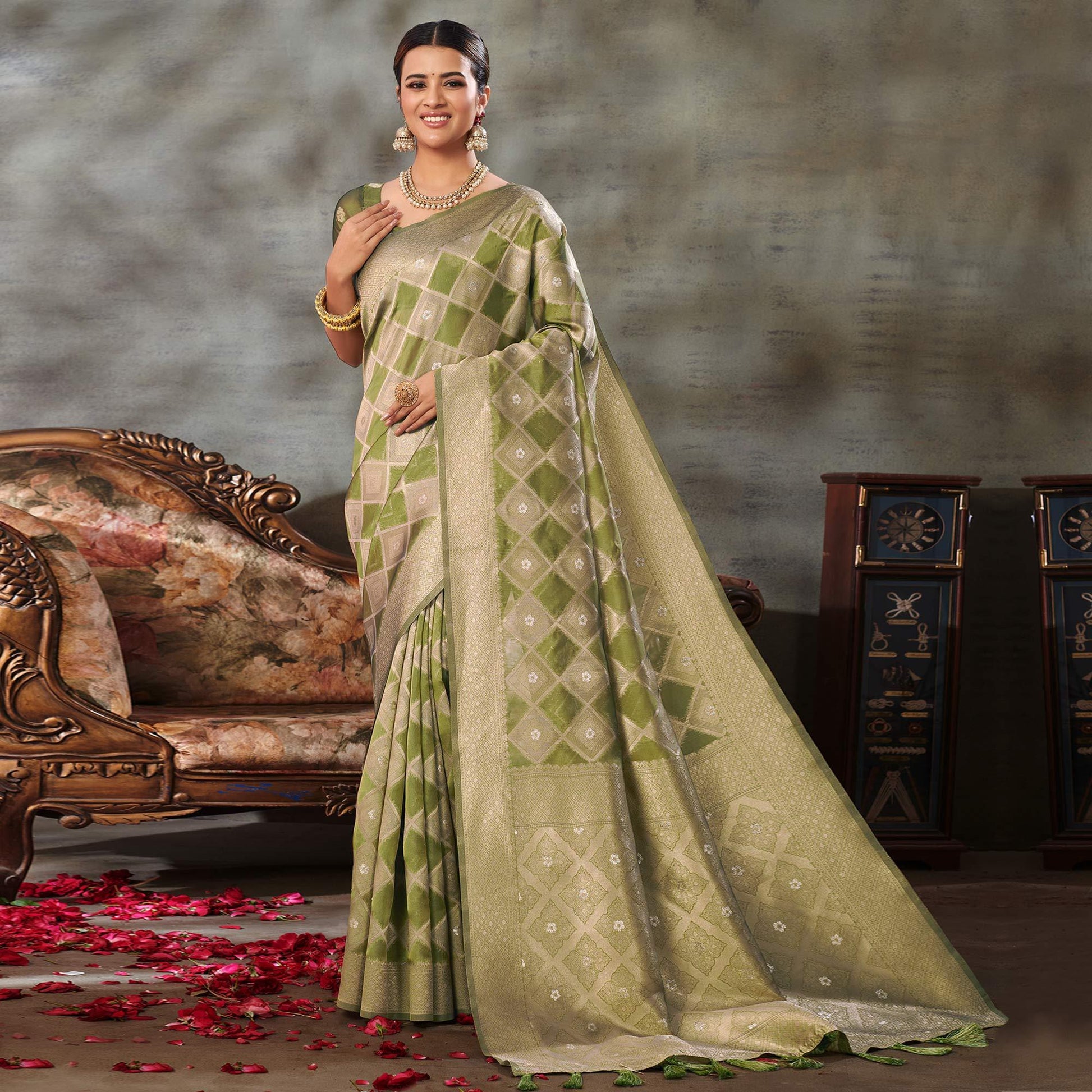 green-woven-organza-saree-with-tassels