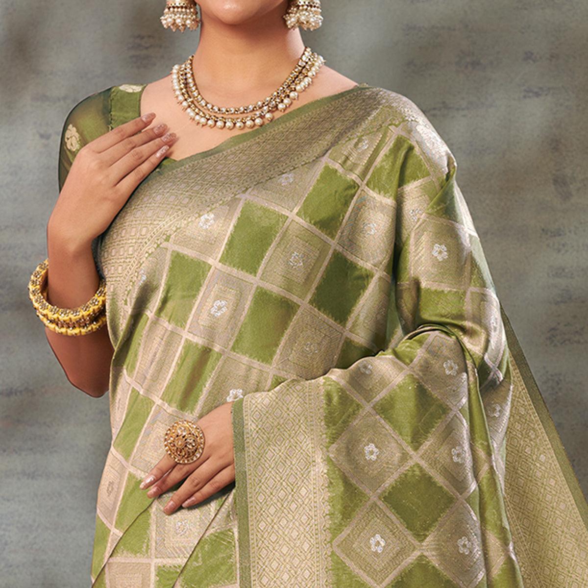 green-woven-organza-saree-with-tassels