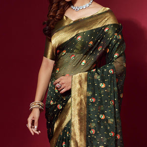 green-woven-organza-saree-with-tassels-143542