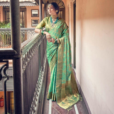 green-woven-pure-silk-saree-with-tassels-144065