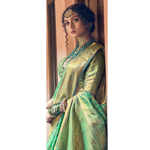 green-woven-pure-silk-saree-with-tassels-144065
