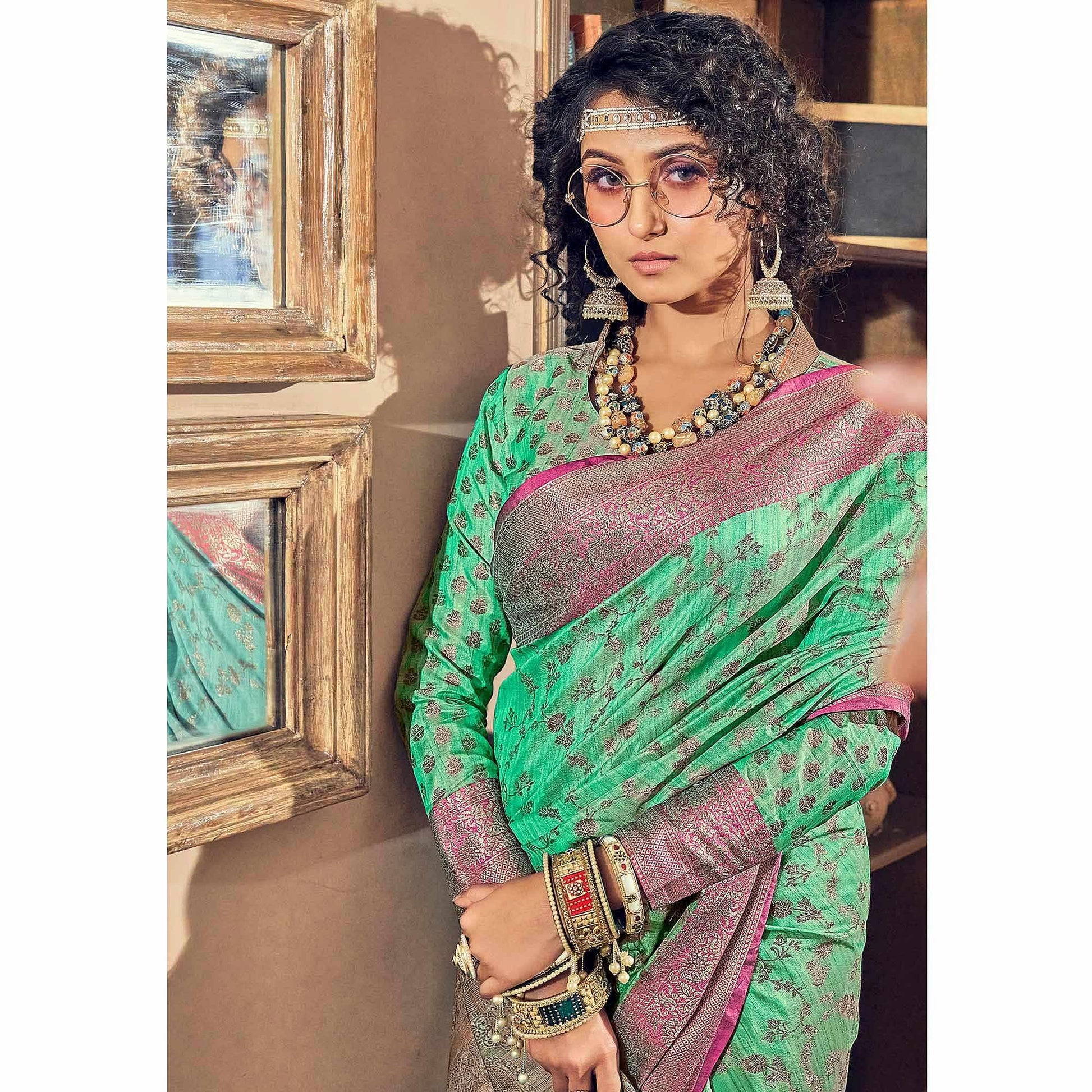 green-woven-pure-silk-saree-with-tassels-144079