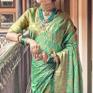 green-woven-pure-silk-saree-with-tassels-144065