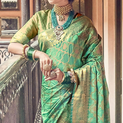green-woven-pure-silk-saree-with-tassels-144065