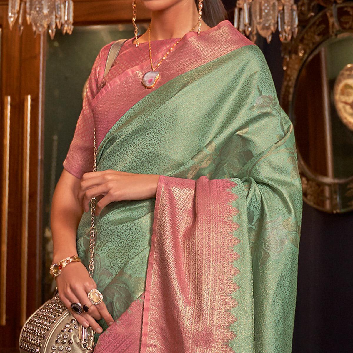 green-woven-pure-silk-saree-with-tassels-145117