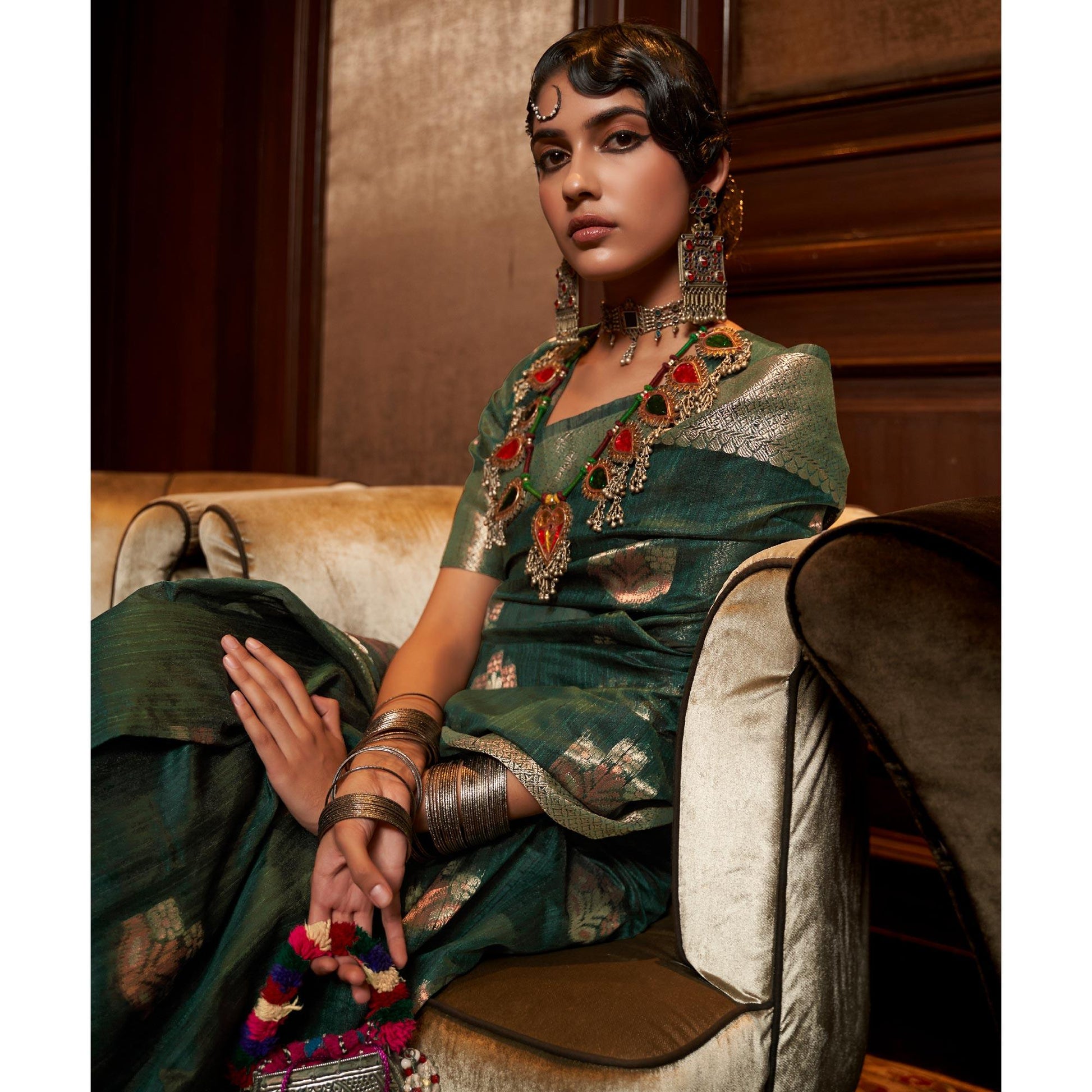 green-woven-pure-silk-saree-with-tassels