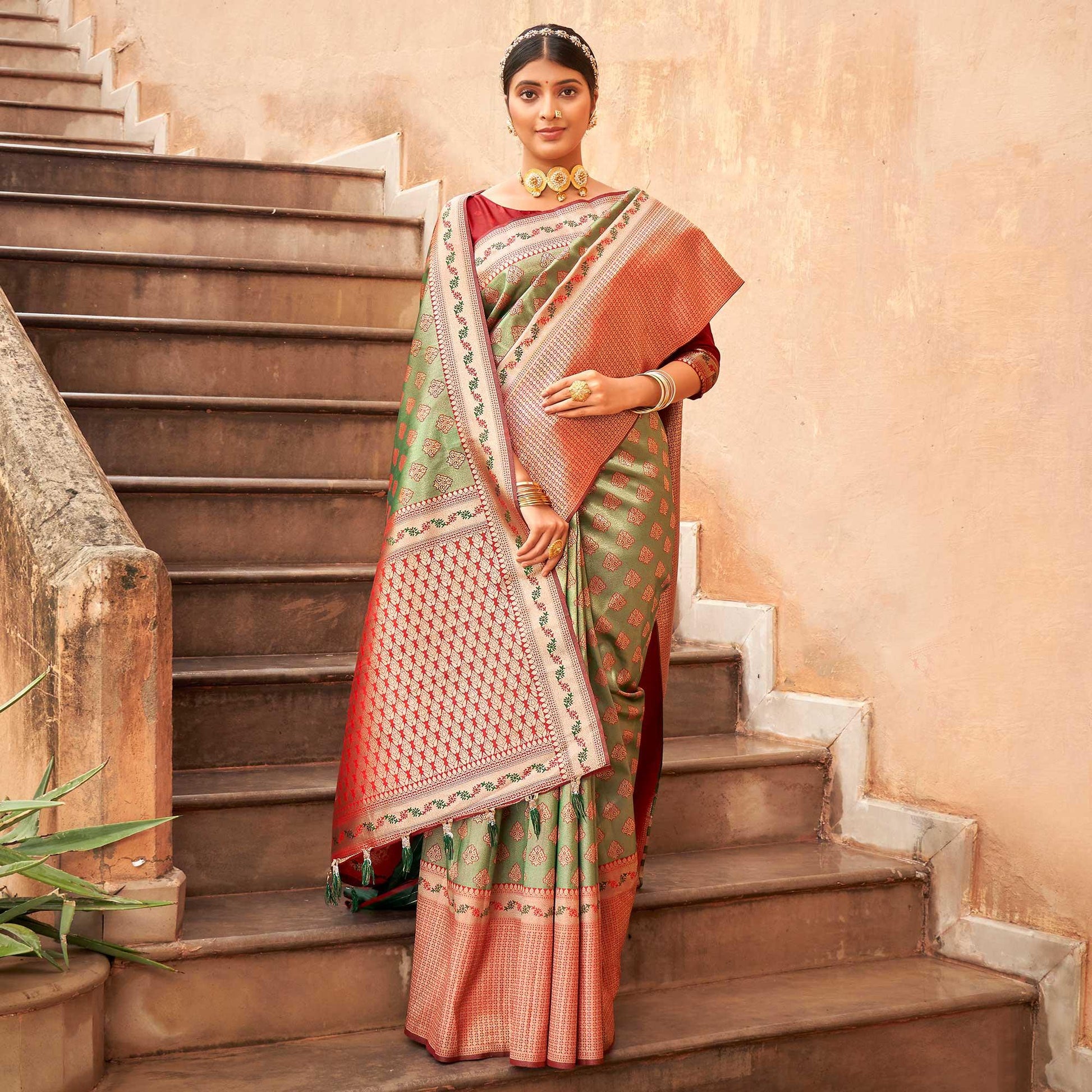green-woven-silk-saree-with-tassels