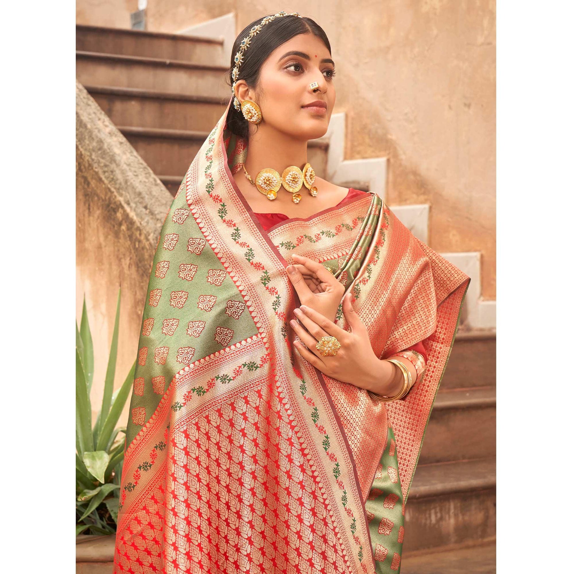 green-woven-silk-saree-with-tassels