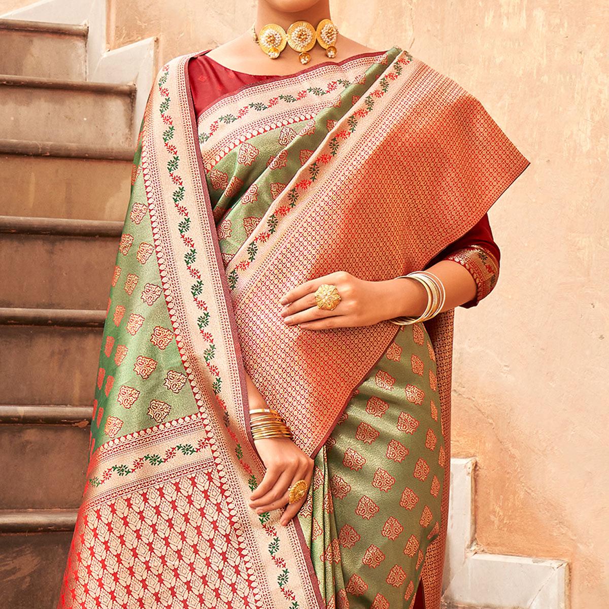 green-woven-silk-saree-with-tassels