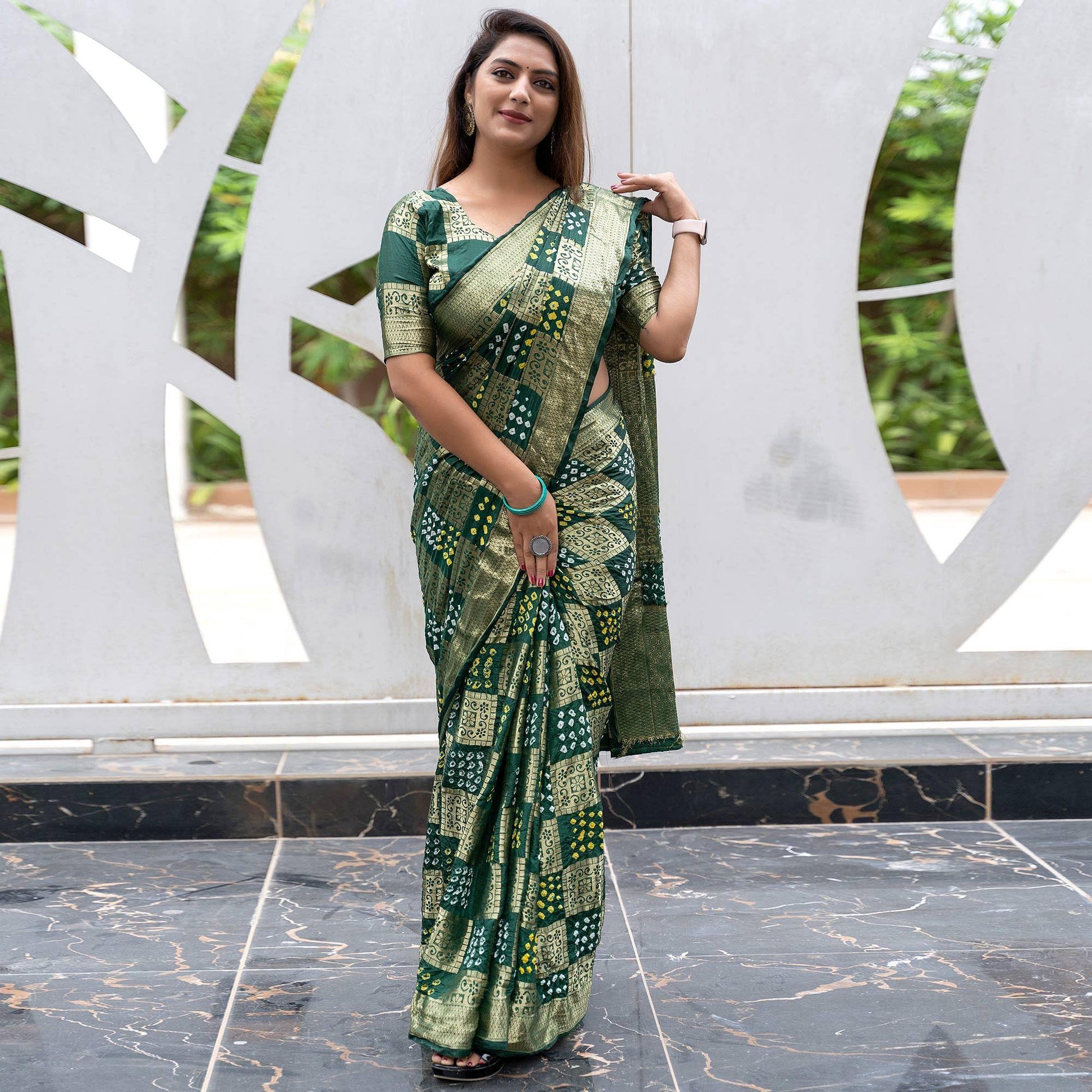 green-festive-wear-woven-with-bandhani-printed-art-silk-saree-142635