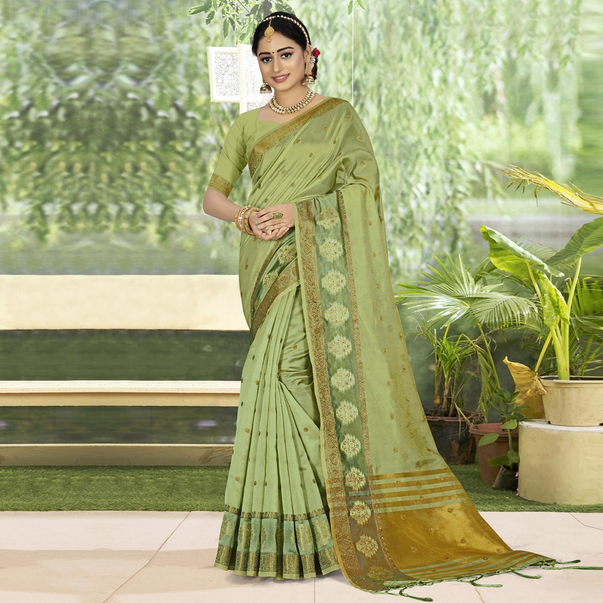 green-woven-with-embellished-organza-saree-with-tassels