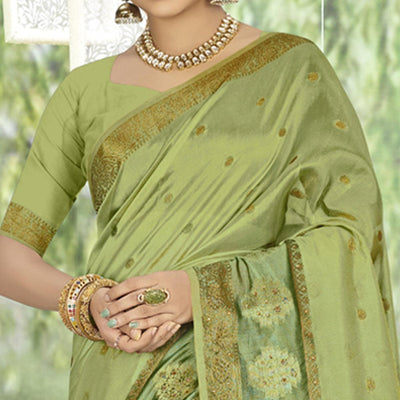 green-woven-with-embellished-organza-saree-with-tassels