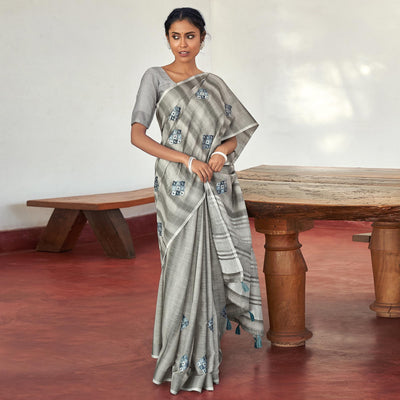 grey-casual-wear-embroidered-linen-saree-with-tassels-139757