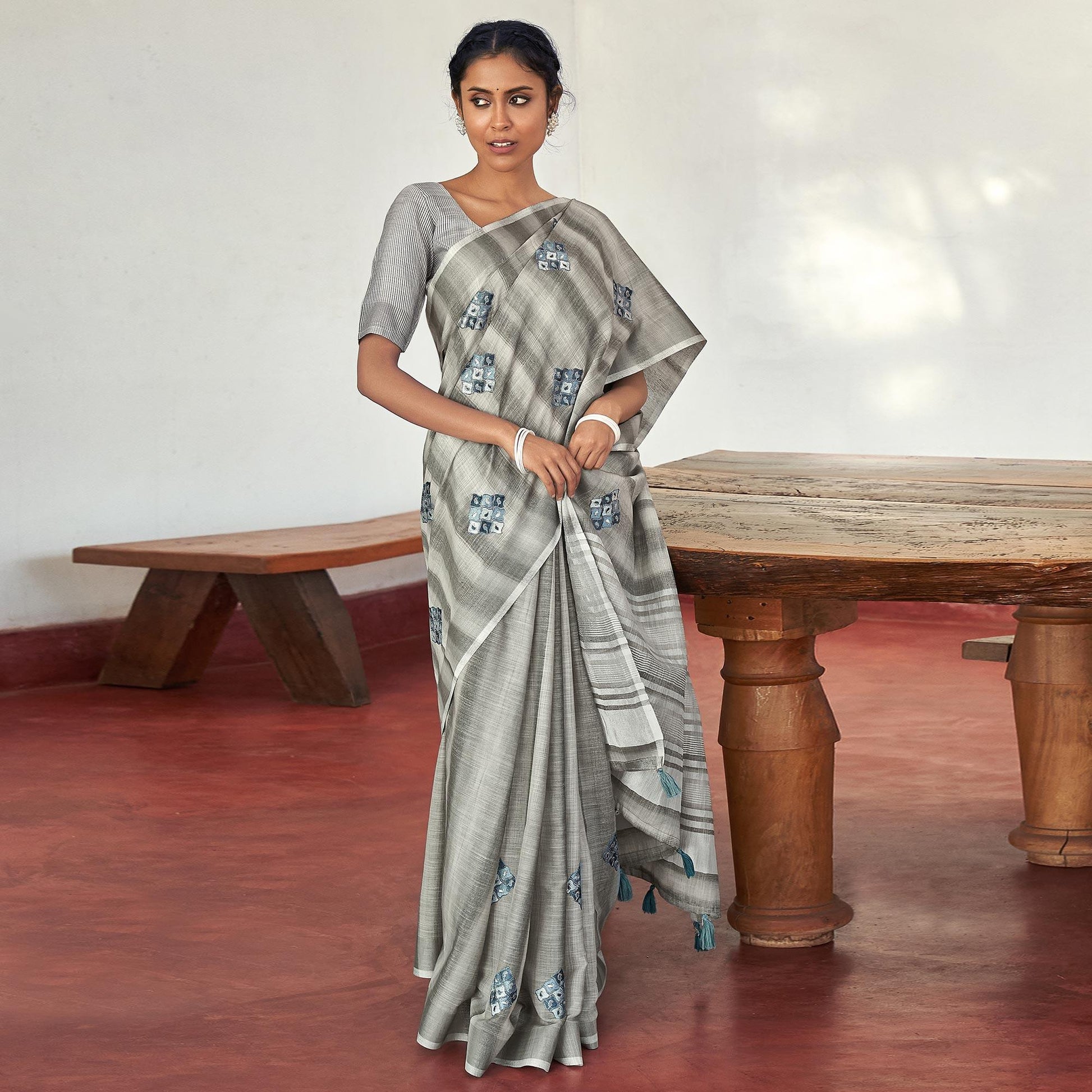 grey-casual-wear-embroidered-linen-saree-with-tassels-139757