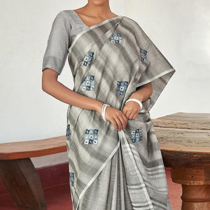 grey-casual-wear-embroidered-linen-saree-with-tassels-139757
