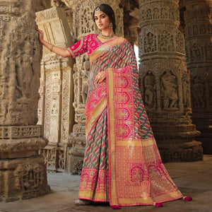 Grey Wedding Wear Woven Silk Saree With Tassels