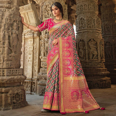 Grey Wedding Wear Woven Silk Saree With Tassels