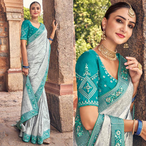 Grey Woven Banarasi Silk Saree With Tassels