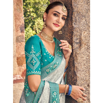 Grey Woven Banarasi Silk Saree With Tassels