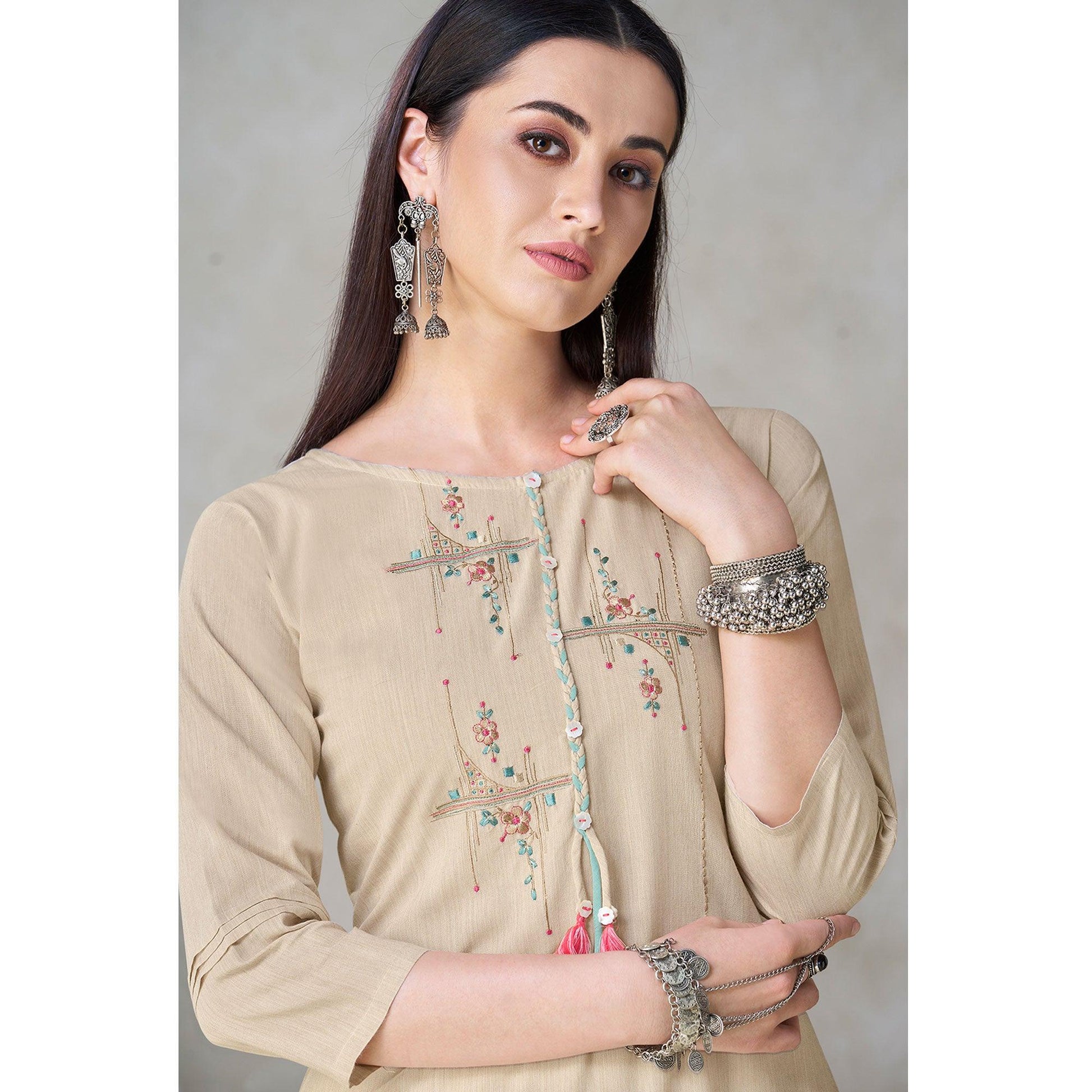 Groovy Beige Colored Partywear Embroidered Viscose Kurti