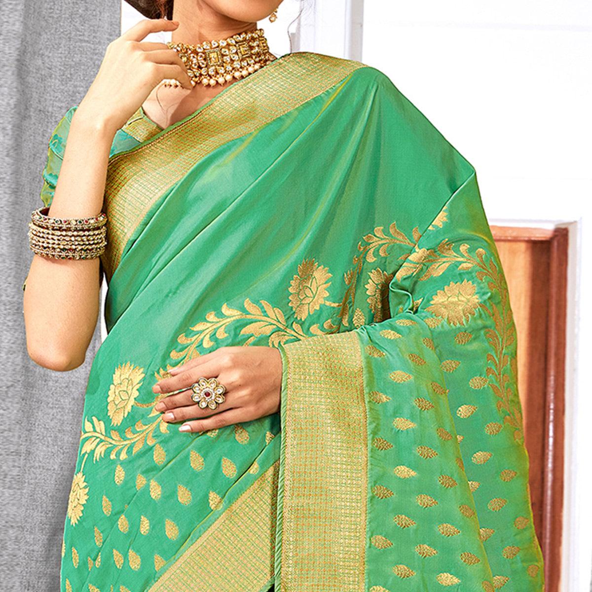 Groovy Turquoise Green Colored Festive Wear Woven Silk Saree