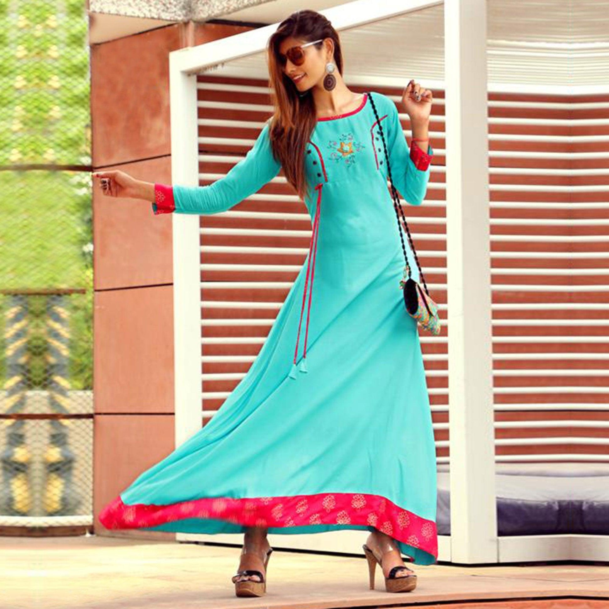 Hypnotic Aqua Blue Colored Partywear Handwork Rayon Long Kurti
