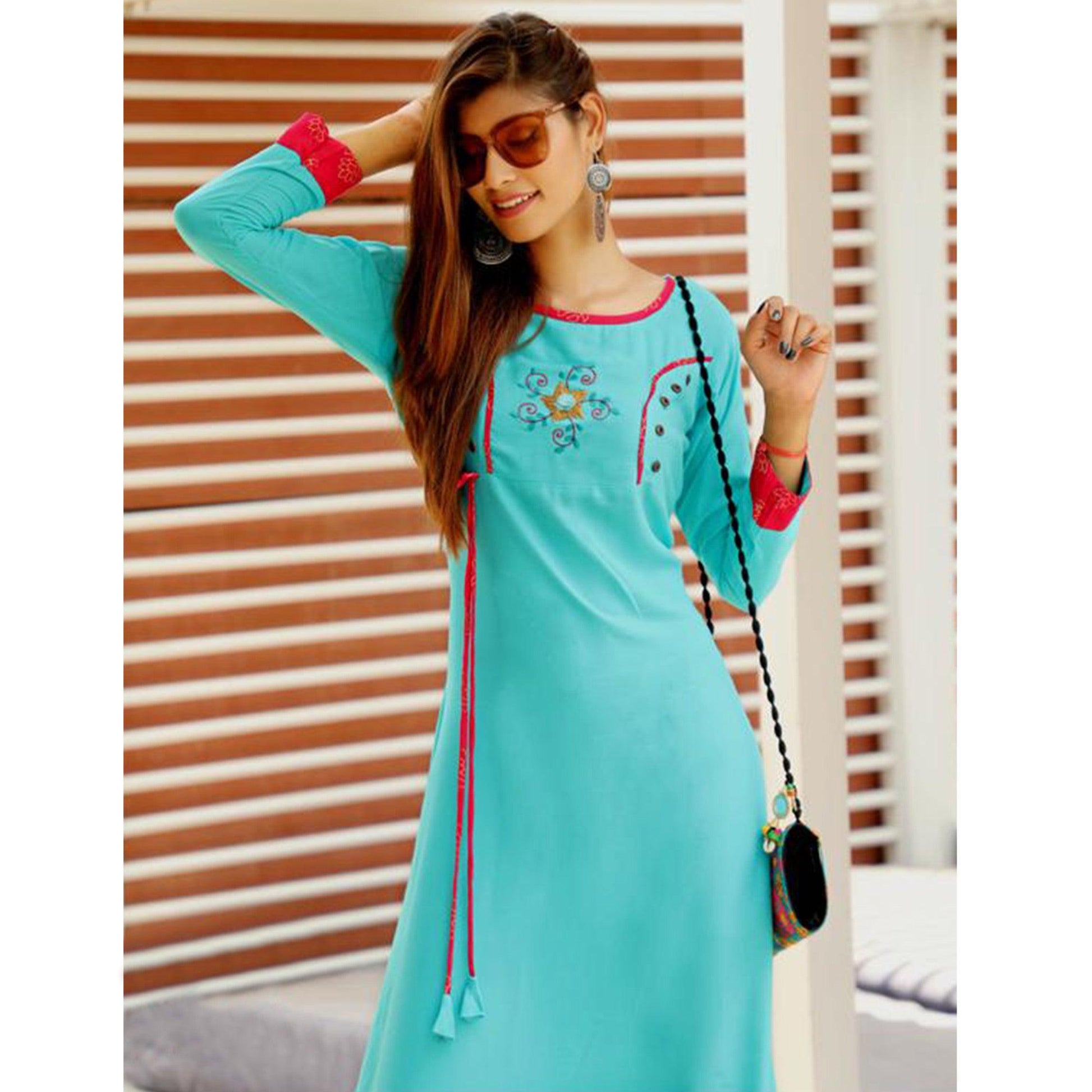 Hypnotic Aqua Blue Colored Partywear Handwork Rayon Long Kurti