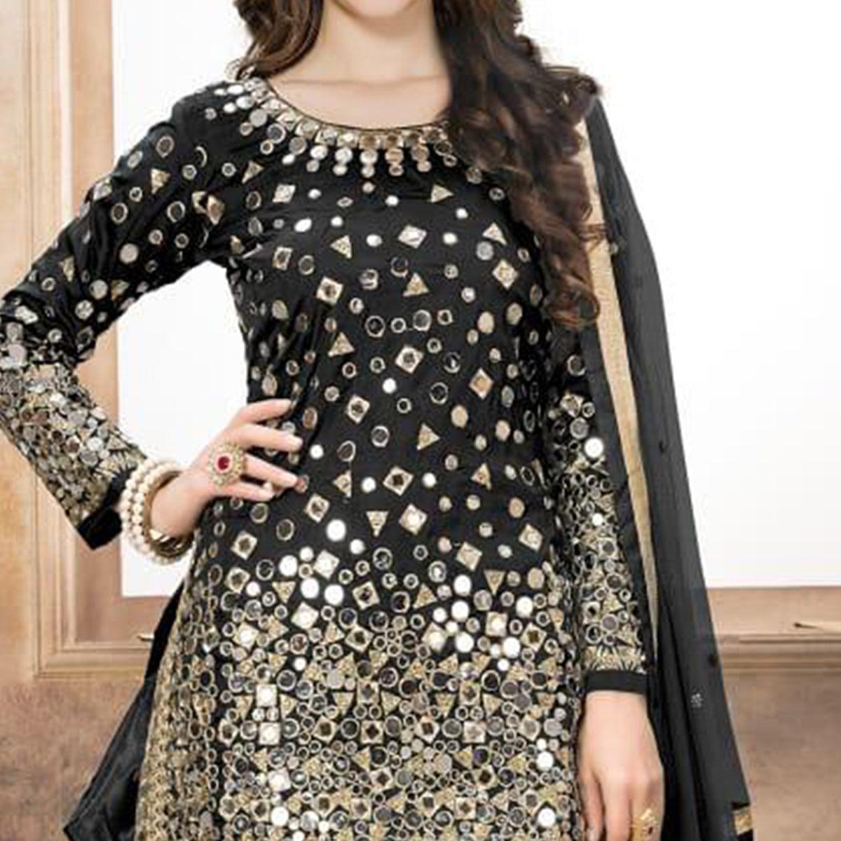Hypnotic Black Colored Partywear Embroidered Tapeta Silk Patiala Suit