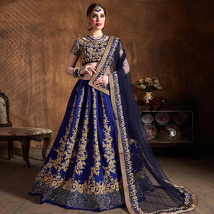 Hypnotic Blue Colored Designer Partywear Raw Silk Lehenga Choli