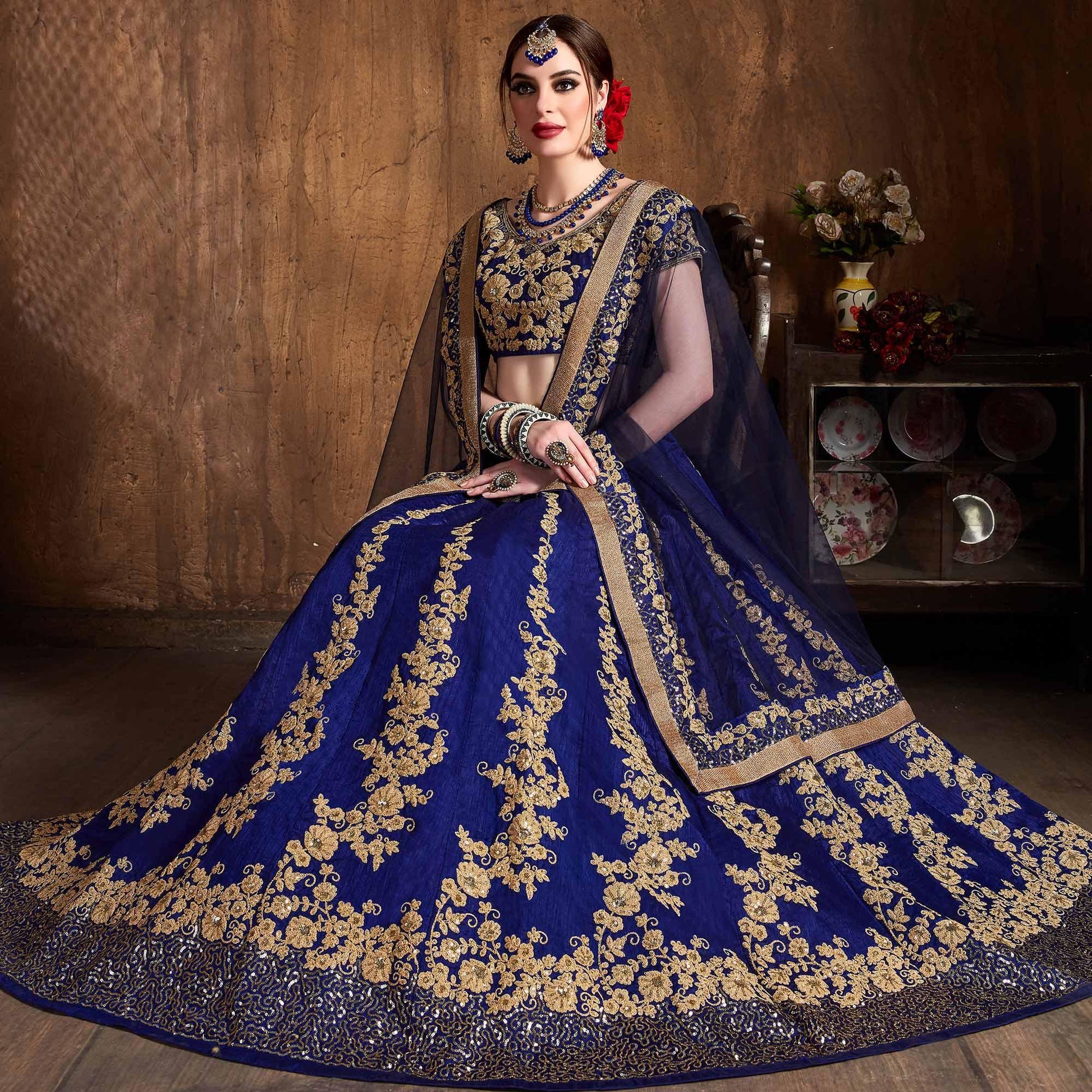Hypnotic Blue Colored Designer Partywear Raw Silk Lehenga Choli