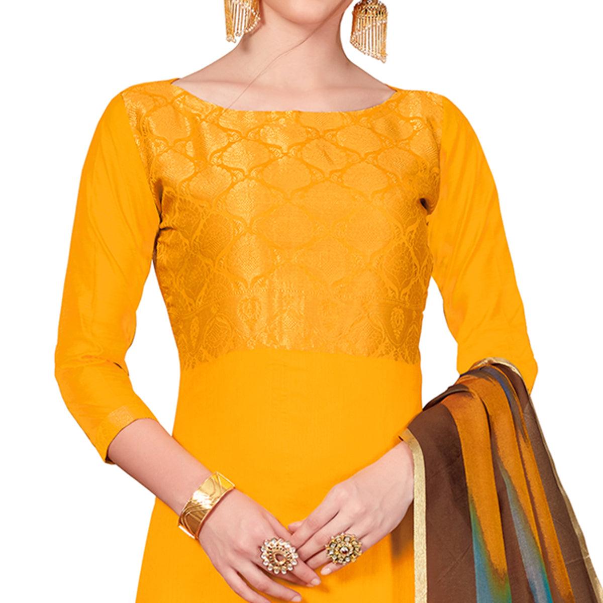 Hypnotic Mustard Yellow Colored Casual Wear Woven Banarasi Silk Dress Material