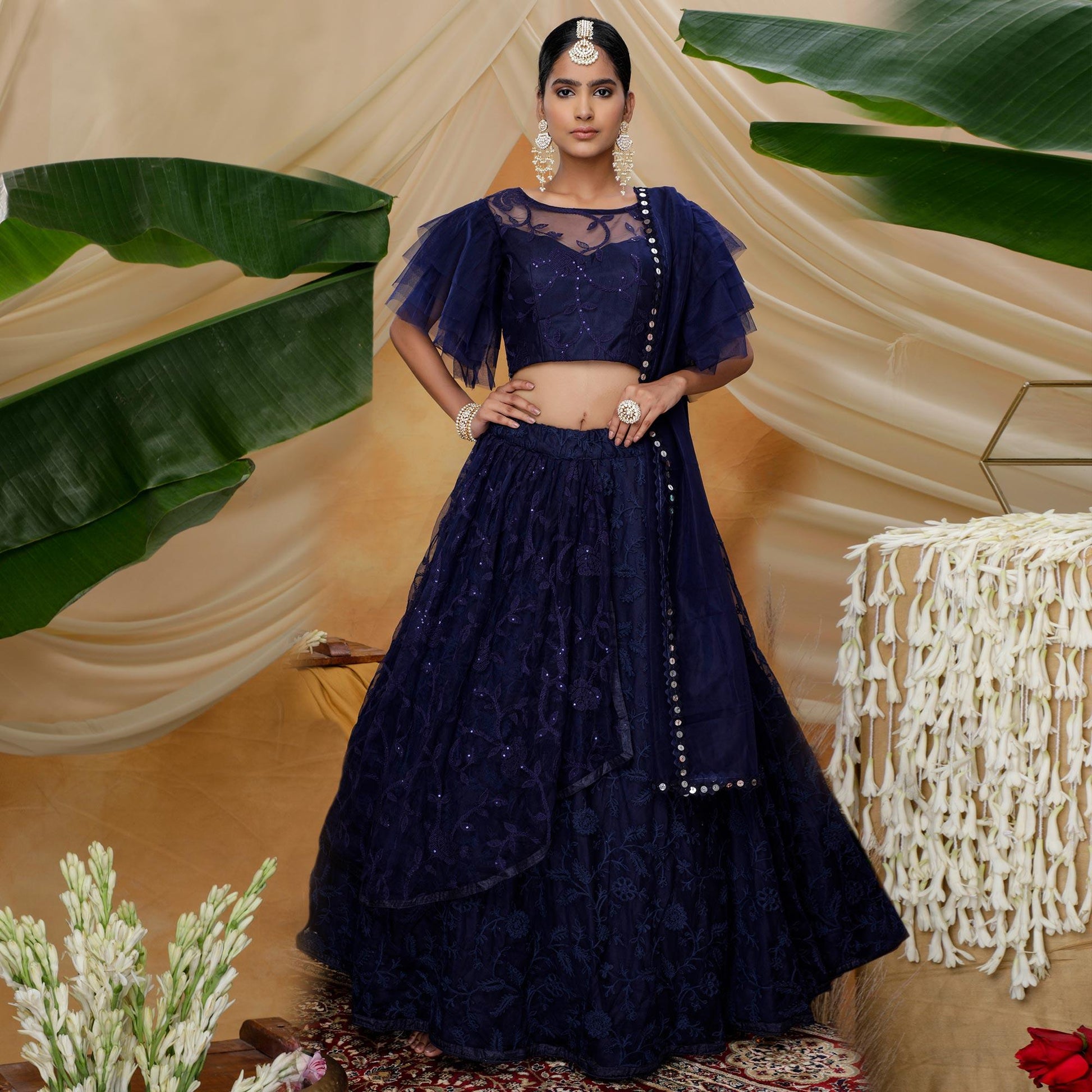 Hypnotic Navy Blue Colored Designer Partywear Embroidered Net Lehenga Choli