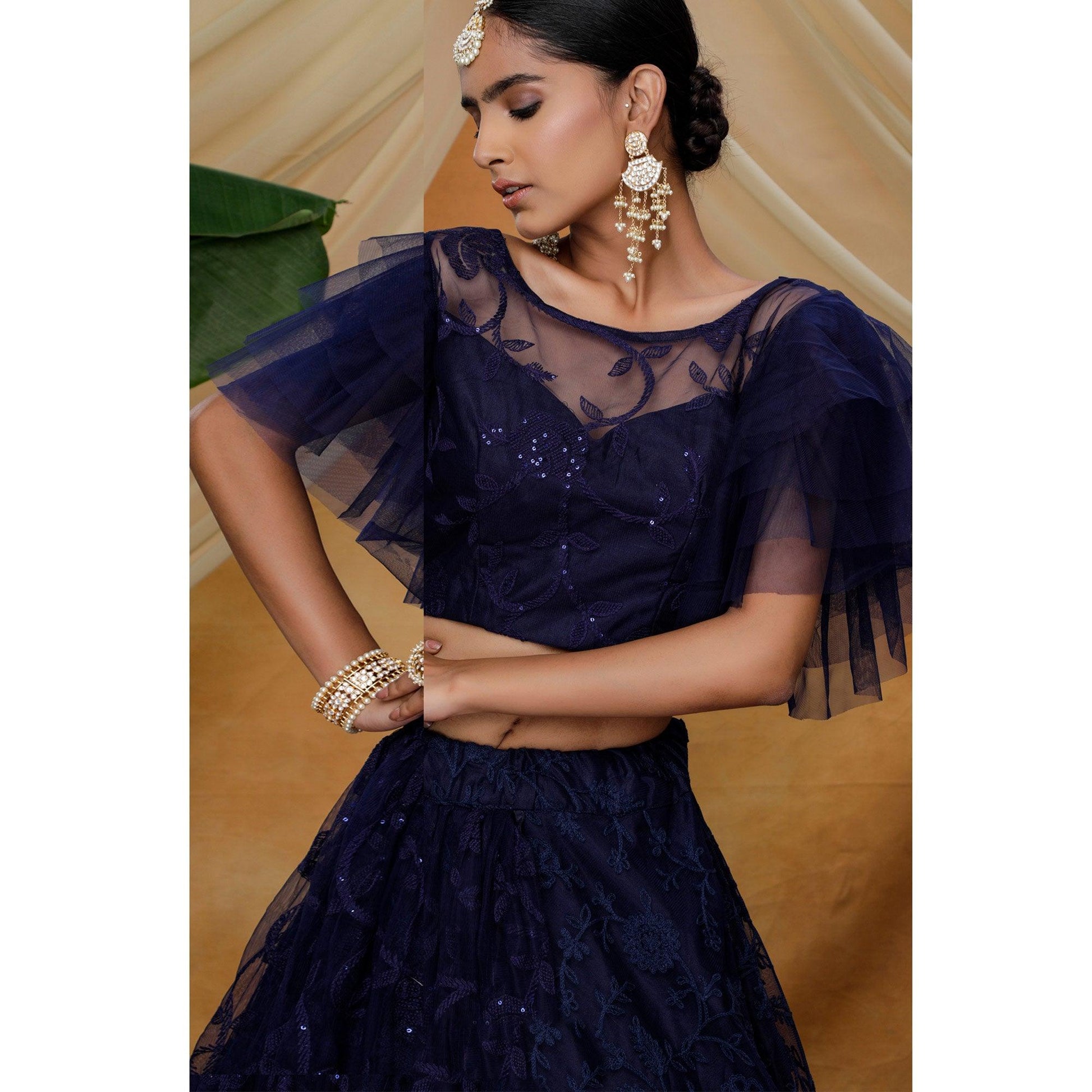 Hypnotic Navy Blue Colored Designer Partywear Embroidered Net Lehenga Choli