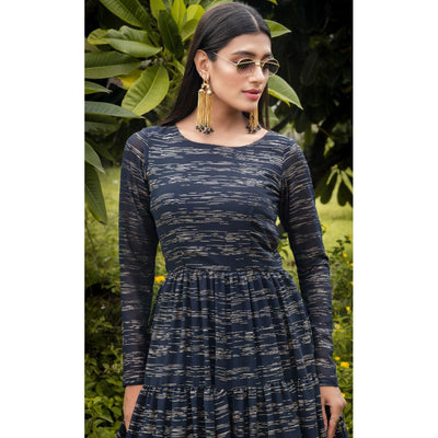 Hypnotic Navy Blue Colored Party Wear Foil Printed Georgette Gown