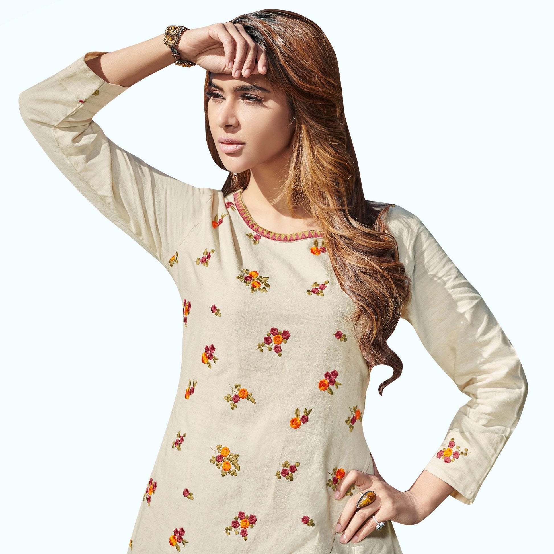 Hypnotic Off White Colored Partywear Embroidered Rayon Kurti