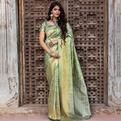 Hypnotic Pista Green Colored Festive Wear Woven Banarasi Silk Saree