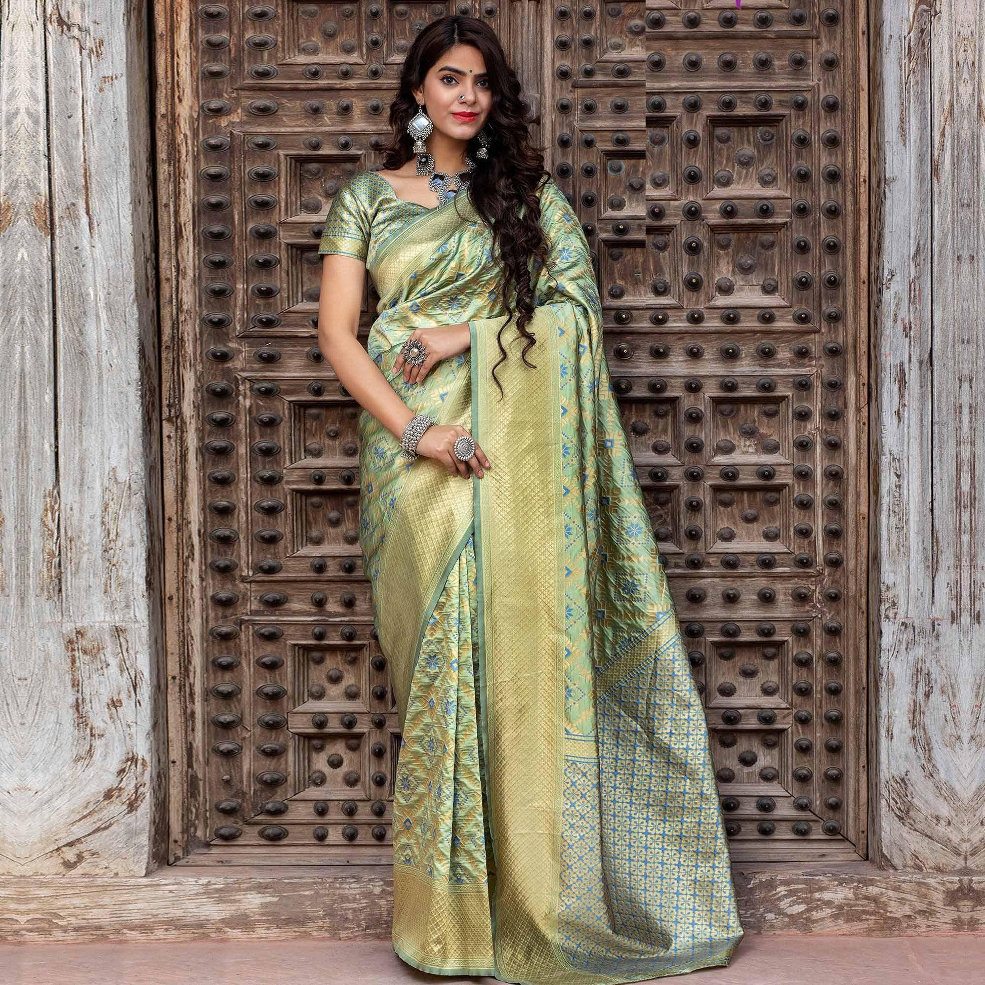 Hypnotic Pista Green Colored Festive Wear Woven Banarasi Silk Saree