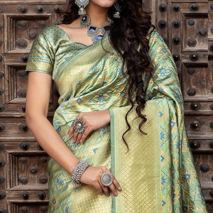 Hypnotic Pista Green Colored Festive Wear Woven Banarasi Silk Saree