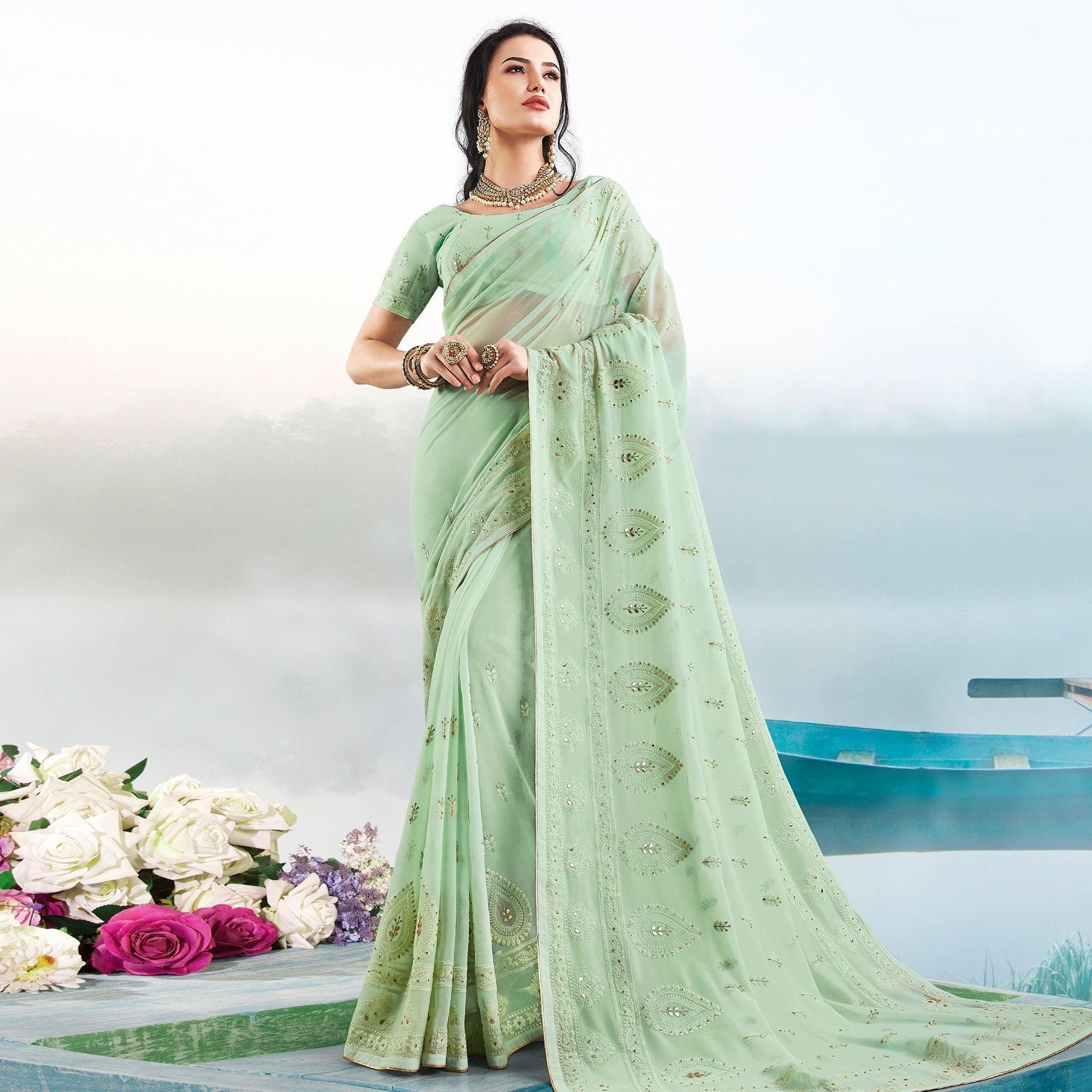 Hypnotic Pista Green Colored Partywear Embroidered Georgette Saree