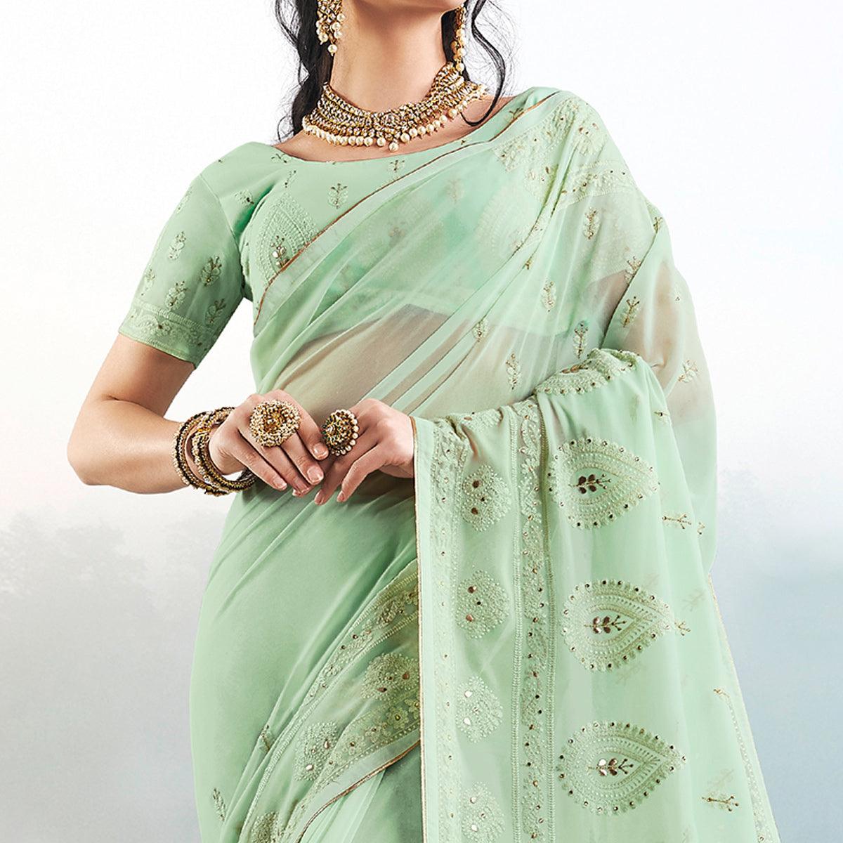 Hypnotic Pista Green Colored Partywear Embroidered Georgette Saree