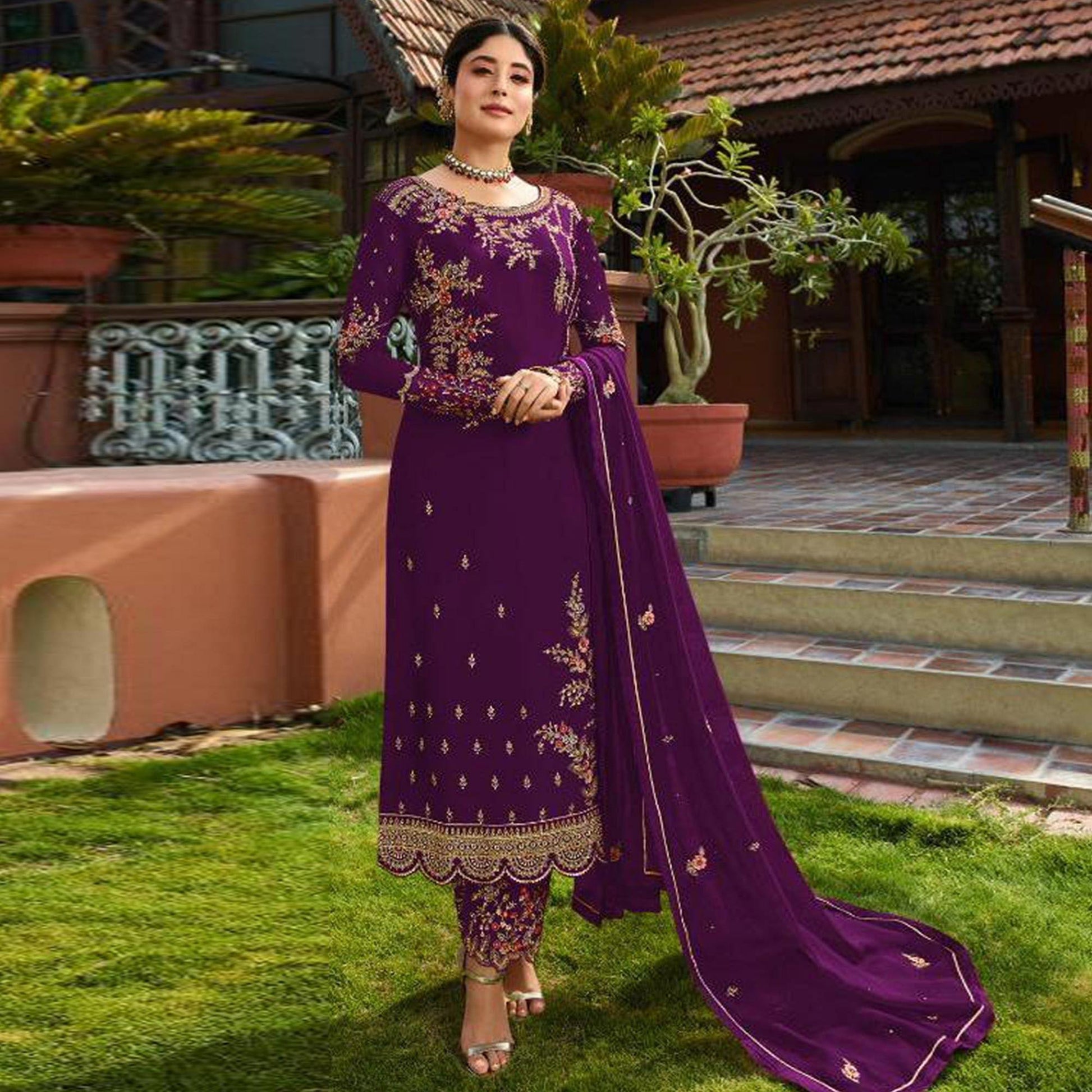 Hypnotic Purple Colored Partywear Embroidered Gerorgette Straight Suit