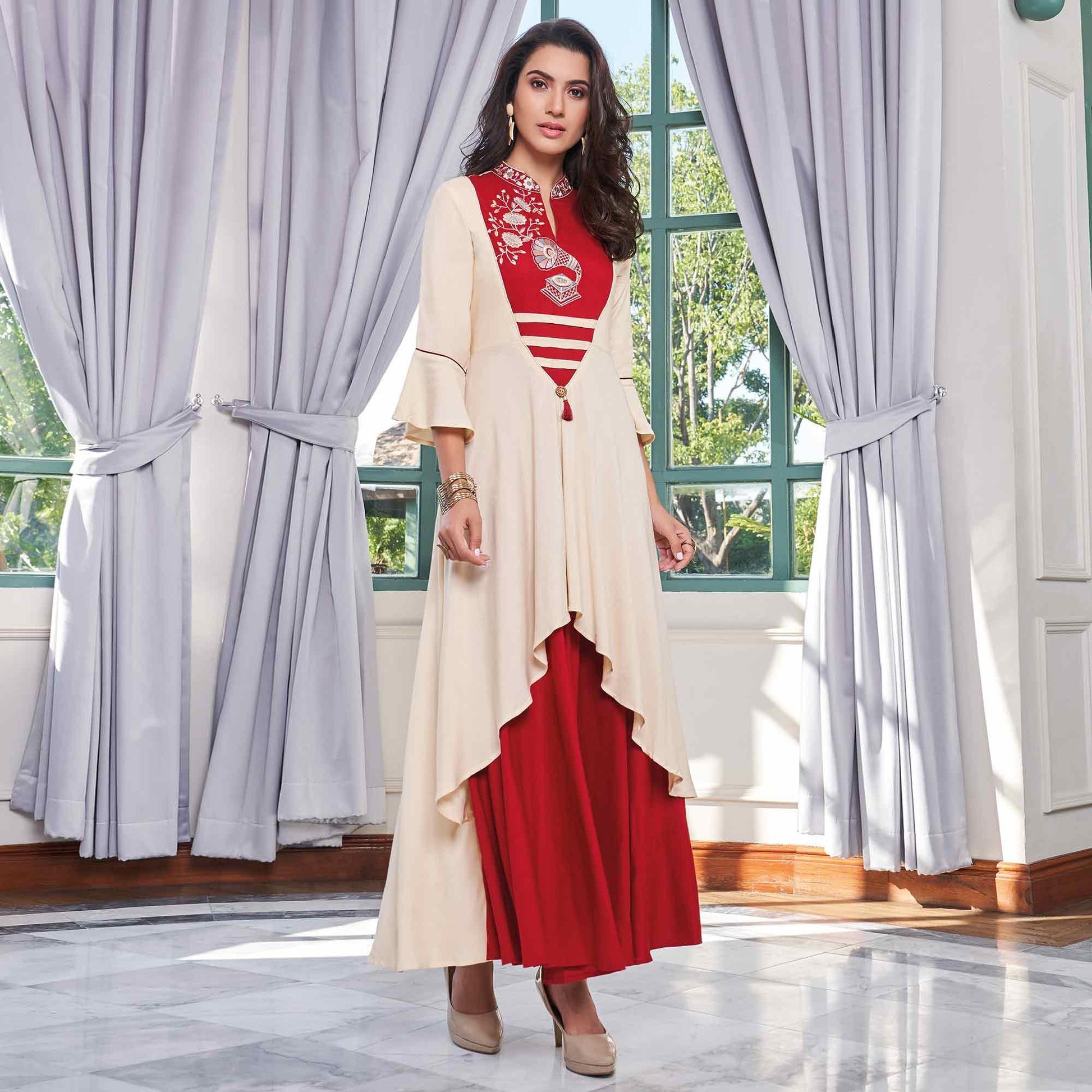 Hypnotic Red-Cream Colored Party Wear Embroidered Rayon Long Kurti