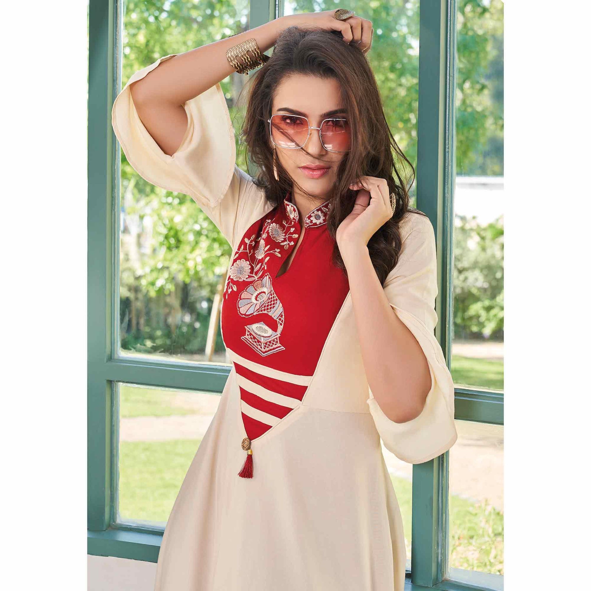 Hypnotic Red-Cream Colored Party Wear Embroidered Rayon Long Kurti