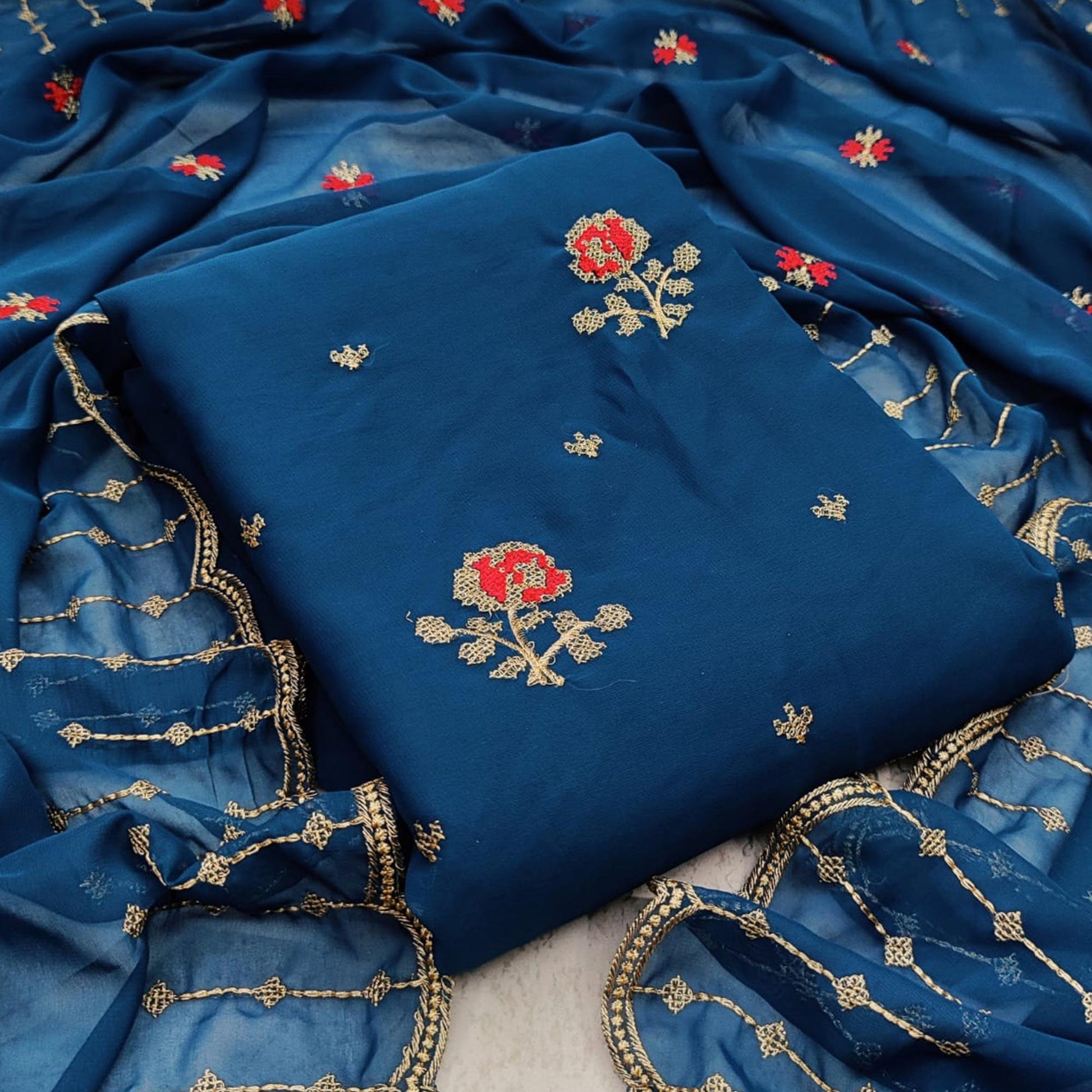 Hypnotic Sky Blue Colored Casual Wear Embroidered Georgette Dress Material