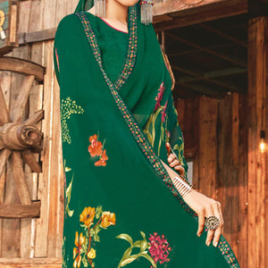 Ideal Bottle Green Coloured Partywear Pure Georgette Floral Printed Saree With Fancy Lace Border
