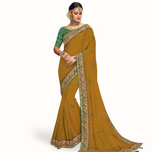 Ideal Mustard Yellow Colored Partywear Embroidered Georgette Saree