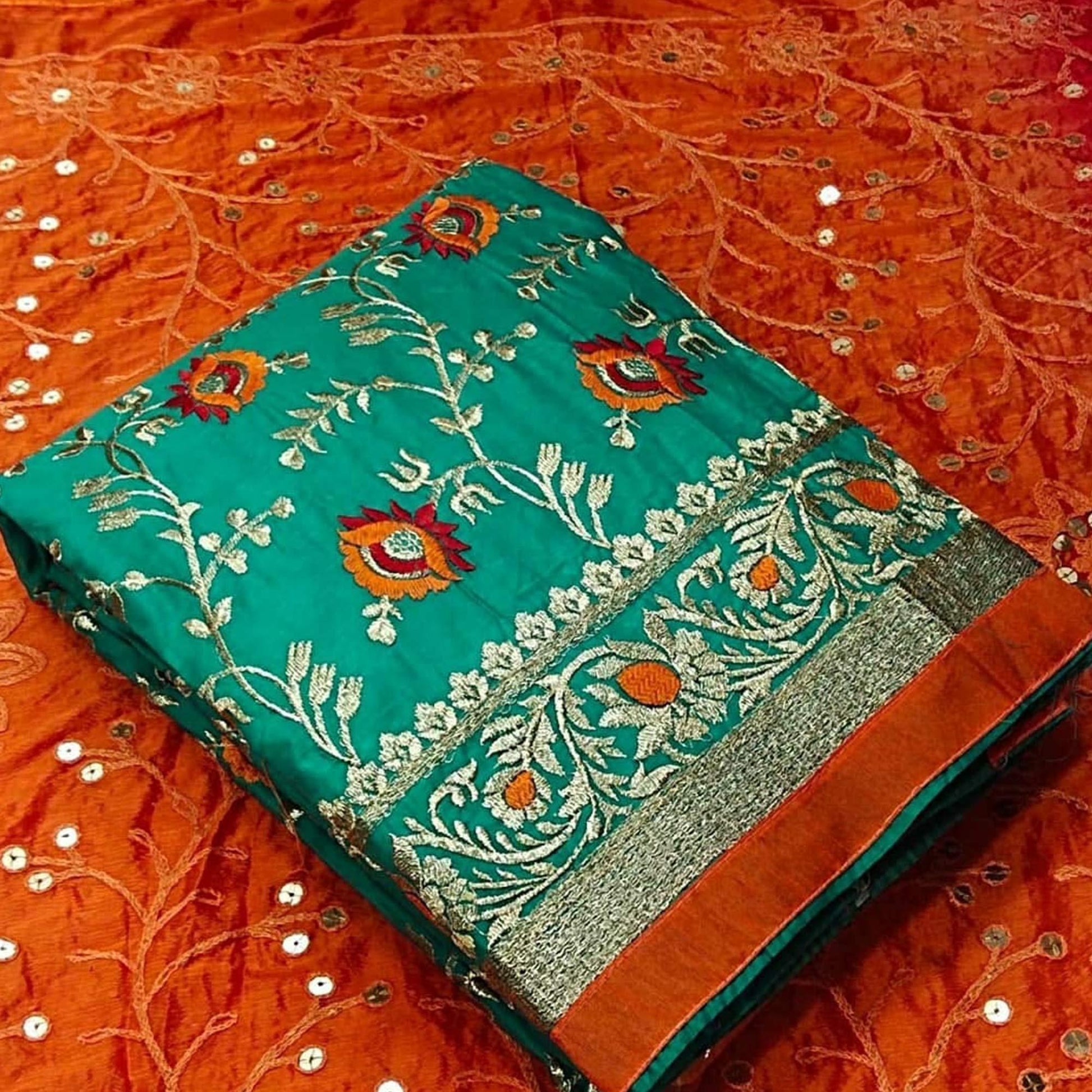 Ideal Turquoise Blue Colored Festive Wear Embroidered Chanderi Dress Material