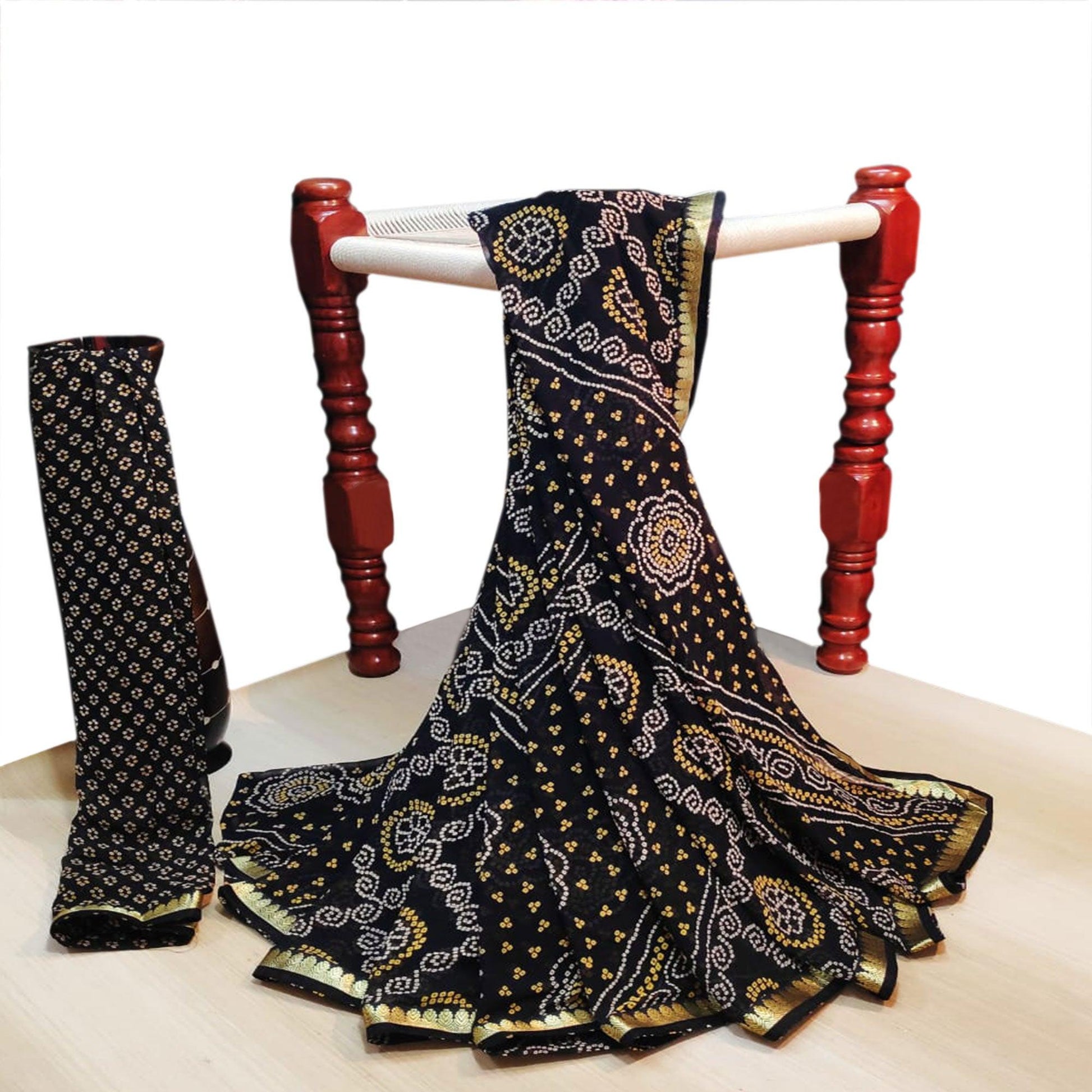 Imposing Black Colored Casual Wear Bandhani Printed Georgette Saree